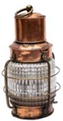 A War Deferment issue copper and brass all round top light: circular chimney over fresnel lens with