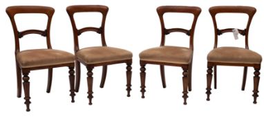 A set of four mid 19th century mahogany dining chairs,