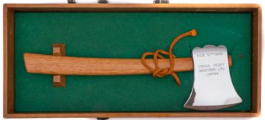 A silver plated launch axe for the bulk liquid tanker 'Michael J Goulandris' February 10th 1965: