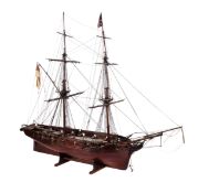 A 19th century scale model of a 16 gun sixth rate sloop: standing rigged and flying a white ensign
