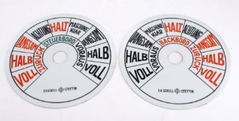 A pair of German 12 1/4 inch opaque glass engine telegraph dials by E A Sckell,