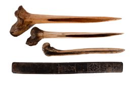 A 19th century baleen busk stay: decorated with incised palm tree,