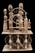 An early 19th century Napoleonic Prisoner-of-War bone 'Spinning Jenny' automaton with three