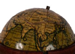 A 2 inch 'Newtons New & Improved Terrestrial Globe, 1838': signed as per title,