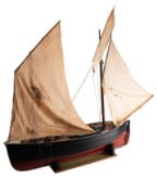 A scale model of a Penzance Lugger 'PZ207': set full sail over simulated plank deck, with capstan,