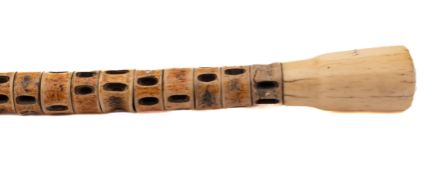 A late 19th century fish vertebra and marine ivory walking cane: the graduated shaft with