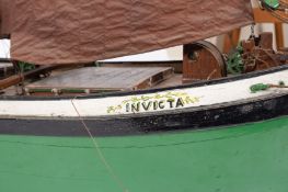 A scale model of the sailing barge,