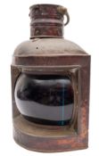 A copper and brass starboard lamp: unsigned, brass swing handle over copper body with blue lens,