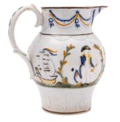 A small Pratt ware 'Admiral Nelson' jug, circa 1800: scroll handle with blue glaze husks,