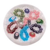 A Clichy garland millefiori paperweight with central pink and white 'Clichy rose' surrounded by a