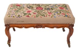 A Victorian carved walnut and pine long stool in 18th century taste; 19th century and adapted;