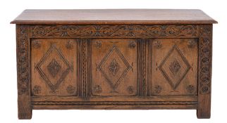 An oak coffer in Jacobean style,