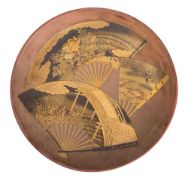 A large Japanese Negoro lacquer Koban [raised tray] lacquered in black and gold with overlapping