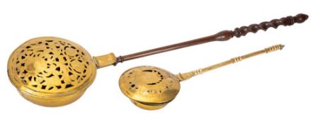 A brass warming pan, early 18th century, possibly Dutch,