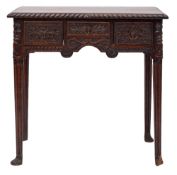 A George III carved oak side table, perhaps Irish,