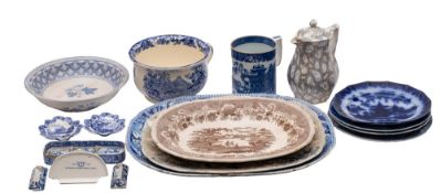 A mixed lot of English transfer printed pottery wares including meat dishes, plates etc [damages].