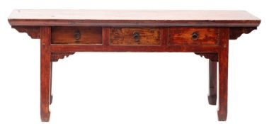 A Chinese elm low side table in 17th century taste,