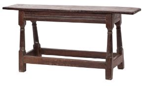 A Charles I or Commonwealth oak long stool,