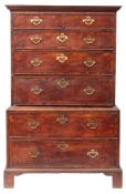 A George II oak and yew banded secretaire chest on chest,