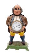 Bramley & Hubbard an American painted cast iron mantel clock modelled as a Georgian gentleman with