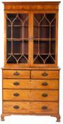 A Regency mahogany and glazed cabinet on chest,