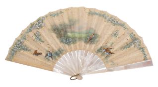 A French mother-of-pearl mounted fan and an early 20th century lace dress the fan embroidered with