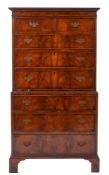 A walnut veneer chest on chest of small size in the 18th Century style,