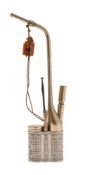 A Chinese white-metal opium pipe with long mouthpiece and engraved lattice decoration,