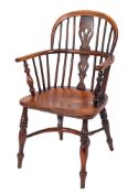 A 19th Century ash and beechwood stick back Windsor elbow chair,