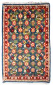 A Veramin rug, the blue field with a characteristic Mina Khani design of birds,