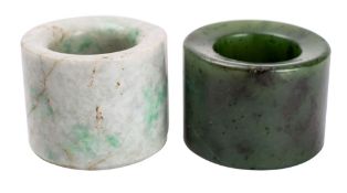 A Chinese spinach jade archer's ring and a similar jadeite archer's ring,