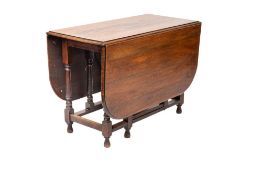 An oak gateleg dining table in late 17th century style,