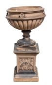 An Arts & Crafts salt glazed sectional stoneware jardiniere and stand,