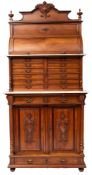 A French walnut and onyx mounted dentist's cabinet,