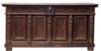 A substantial oak coffer,
