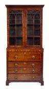 A Regency Scottish mahogany and inlaid secretaire chest with associated bookcase,