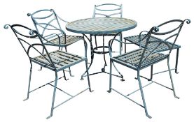 A suite of painted iron garden furniture, modern; comprising a circular table,