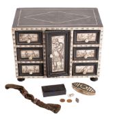 A North Italian inlaid ebonised table cabinet of rectangular form with three drawers around a