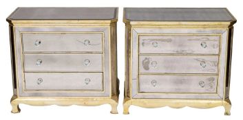 A pair of mirror plate covered chests of drawers,