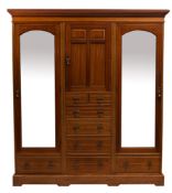 An Edwardian mahogany compactum wardrobe,
