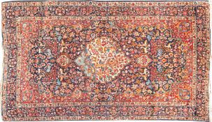 A Kirman carpet,