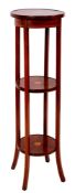 An Edwardian mahogany and inlaid circular three tier jardiniere stand,