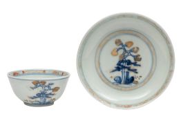 A Chinese Nankin Cargo porcelain tea bowl and saucer,