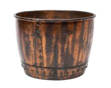 A Victorian copper basin, now utilised as a log bin,