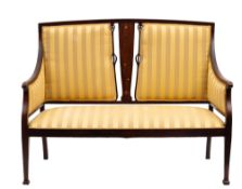 An Edwardian mahogany and marquetry settee,