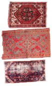 A Kurdish rug, the rose hexagonal stepped field with a central shaded geometric pole medallion,