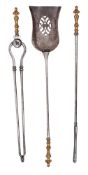 A set of three steel and brass mounted fire irons in George III style,