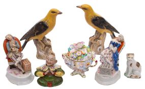 A group of Continental porcelain, including a pair of yellow songbirds,