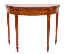 A George III satinwood and inlaid half round card table, crossbanded in tulipwood,