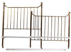 A Victorian gilt brass and iron bedstead,